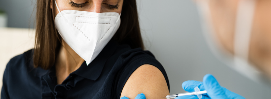 Photo of a woman receiving a vaccine