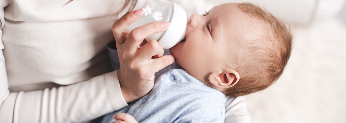 Picture of a mother bottle feeding her baby