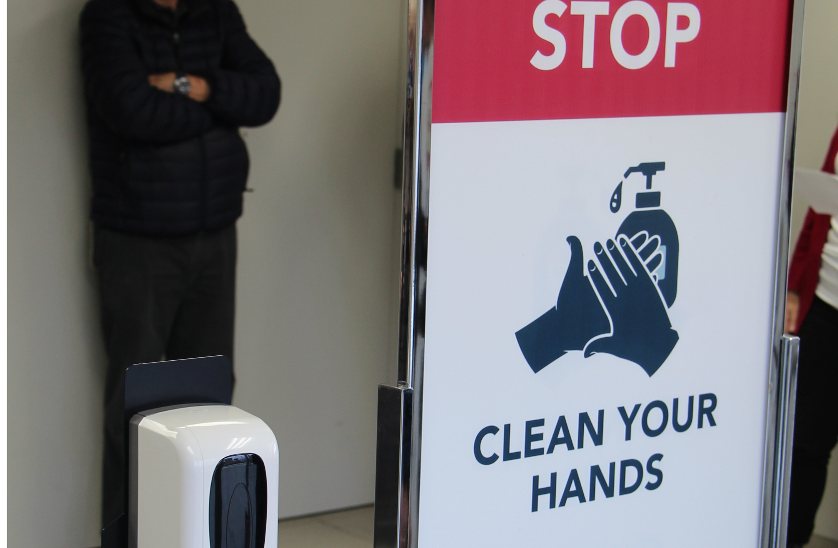 Picture of a sign asking people to wash their hands