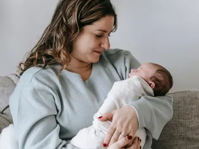 Woman holding baby